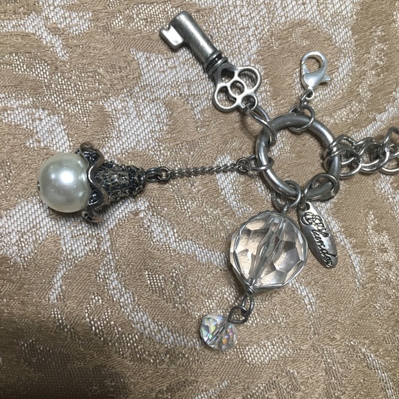 Plunder 28”long silver pendant w/ multiple charms - Picture 2 of 3